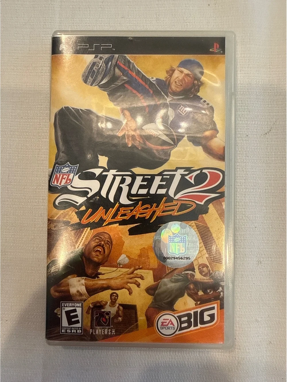 PSP Game Bundle - NFL Street 2 Unleashed, Metal Gear Solid Portable Ops Plus, &